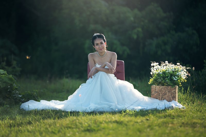 Woman in elegant black tie wedding outfit